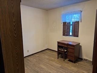 unfurnished room featuring light hardwood / wood-style floors