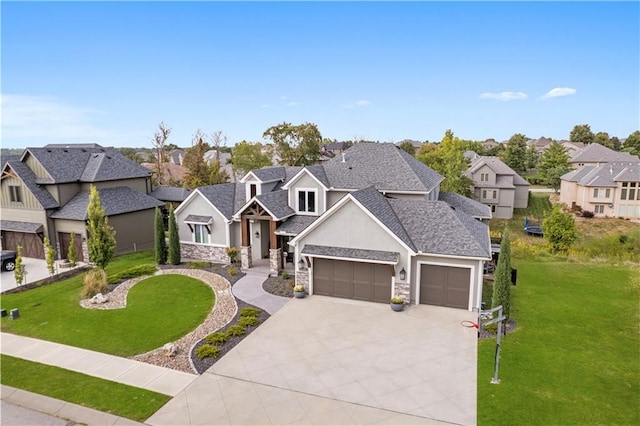 view of front of property with a shingled roof, a residential view, an attached garage, a front yard, and stucco siding