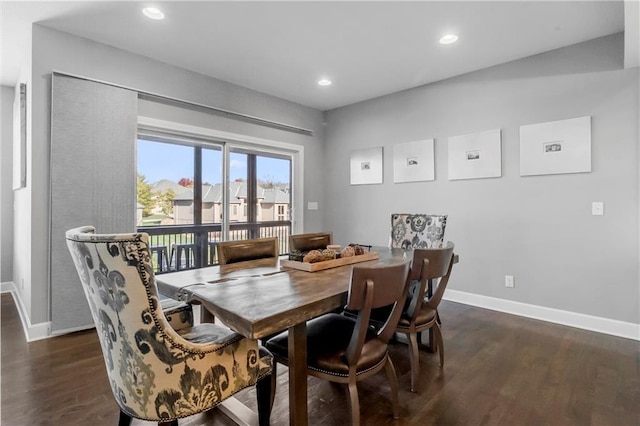 dining room featuring dark wood-type flooring, recessed lighting, and baseboards