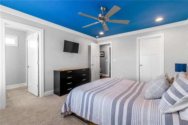 bedroom featuring light carpet, recessed lighting, a ceiling fan, and baseboards