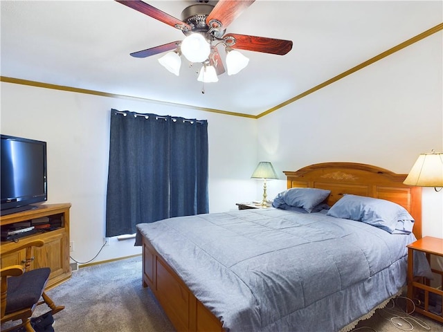 bedroom featuring ceiling fan, crown molding, and dark colored carpet