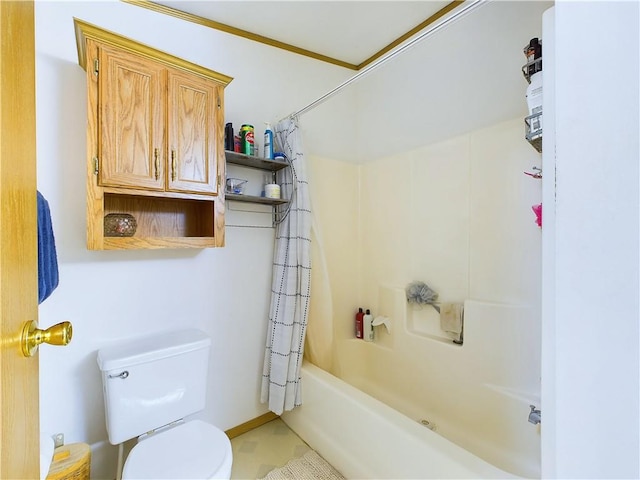 bathroom with toilet and shower / bath combo