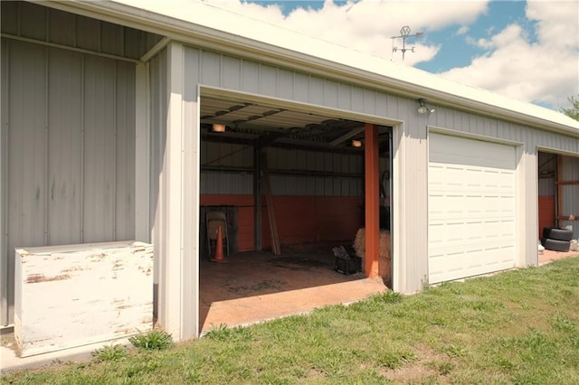 view of outbuilding featuring an outdoor structure and a garage