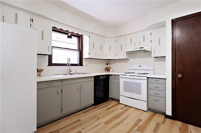 kitchen featuring white appliances, white cabinetry, sink, gray cabinets, and light hardwood / wood-style flooring