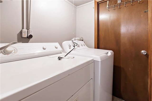 washroom featuring separate washer and dryer