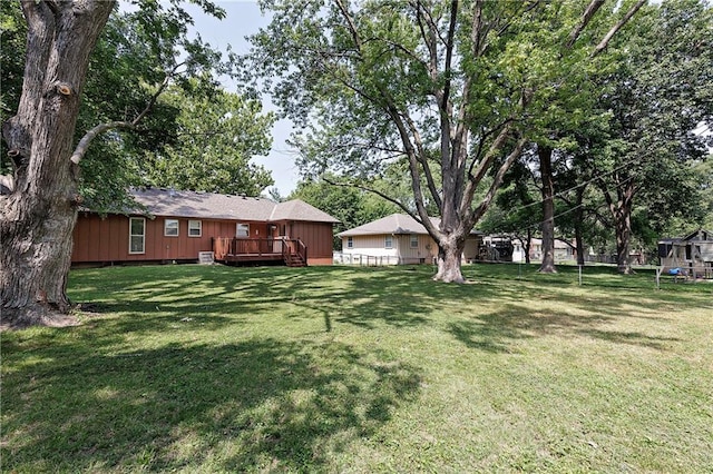 view of yard with a deck