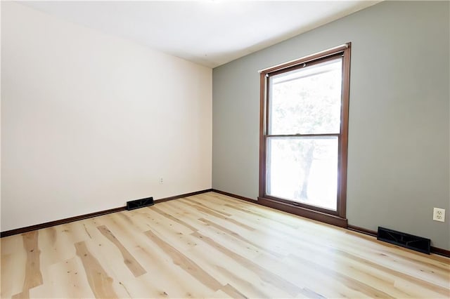 empty room featuring light wood-type flooring