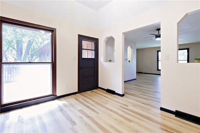 entrance foyer featuring ceiling fan and light hardwood / wood-style flooring