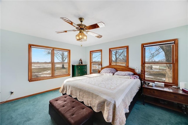 bedroom with baseboards, carpet, and ceiling fan