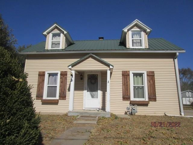 view of new england style home