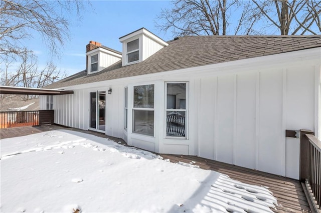 view of snow covered property