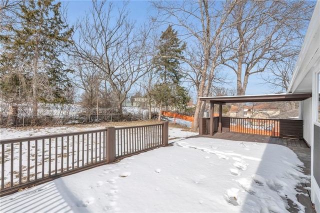 view of snow covered deck