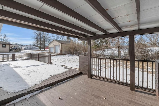 view of snow covered deck