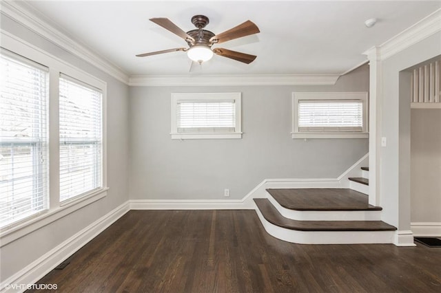 unfurnished room with dark wood-style floors, baseboards, stairs, and ornamental molding