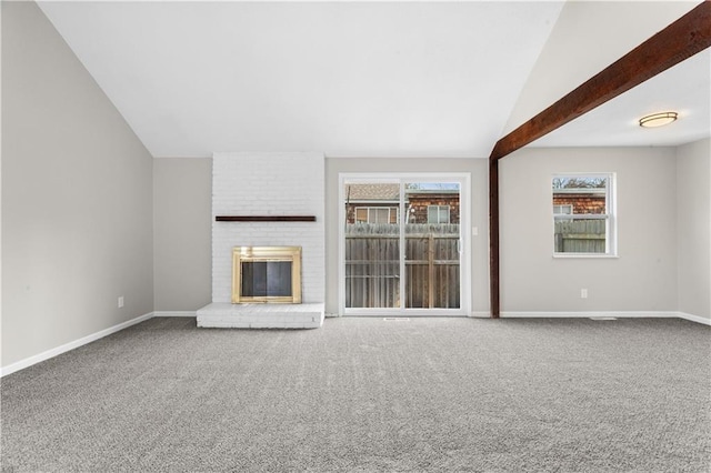 unfurnished living room with a brick fireplace, carpet floors, and vaulted ceiling with beams