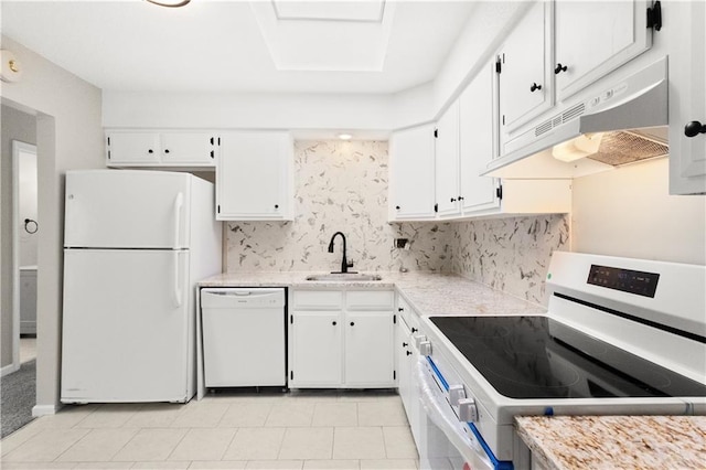 kitchen featuring light tile patterned flooring, white cabinetry, sink, backsplash, and white appliances