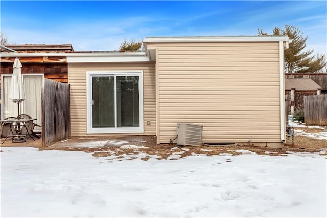 view of snow covered house