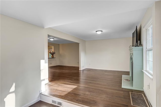 interior space with dark hardwood / wood-style flooring