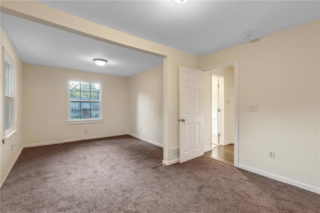 view of carpeted spare room