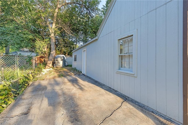 view of side of home featuring a patio