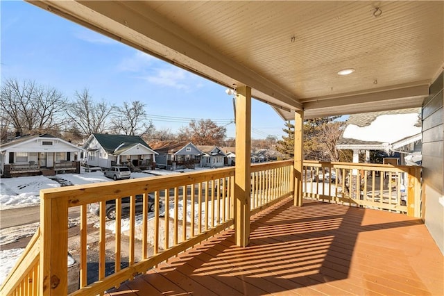 view of snow covered deck