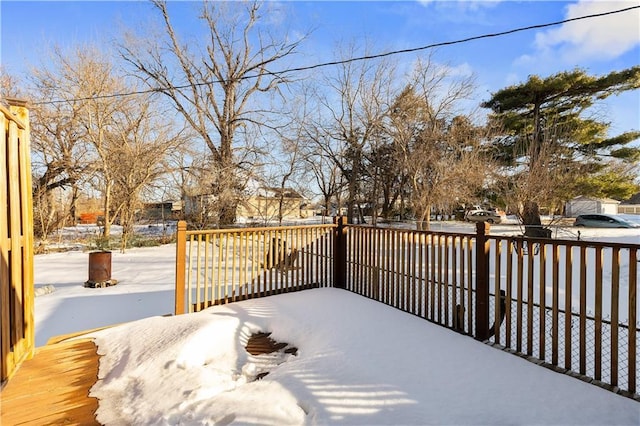 view of snow covered deck