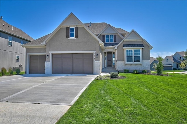 view of front facade featuring stucco siding, stone siding, roof with shingles, concrete driveway, and a front yard