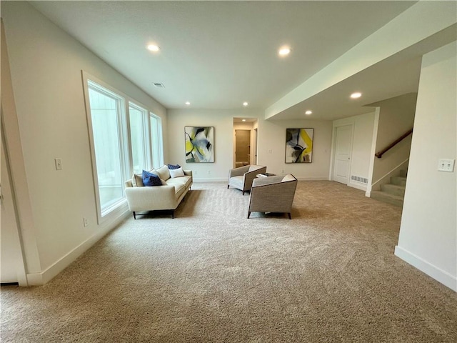 18300 Monrovia St, Overland Park, KS 66013 - living area with carpet floors, recessed lighting, and stairway