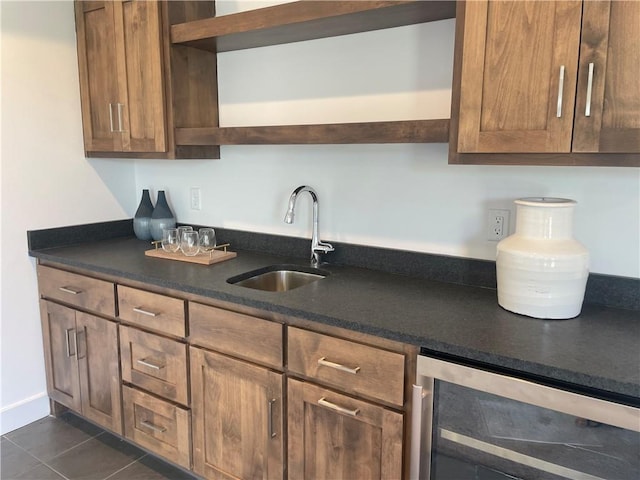18300 Monrovia St, Overland Park, KS 66013 - kitchen featuring open shelves, wine cooler, dark countertops, and dark tile patterned floors