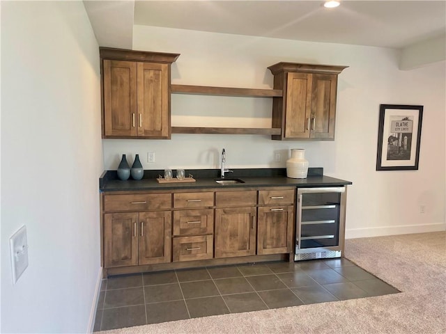 18300 Monrovia St, Overland Park, KS 66013 - indoor wet bar featuring wine cooler, dark colored carpet, and dark tile patterned flooring