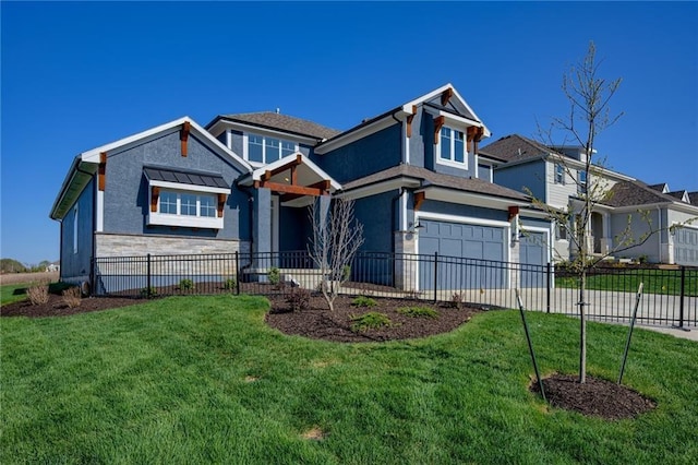 craftsman house featuring a garage and a front yard