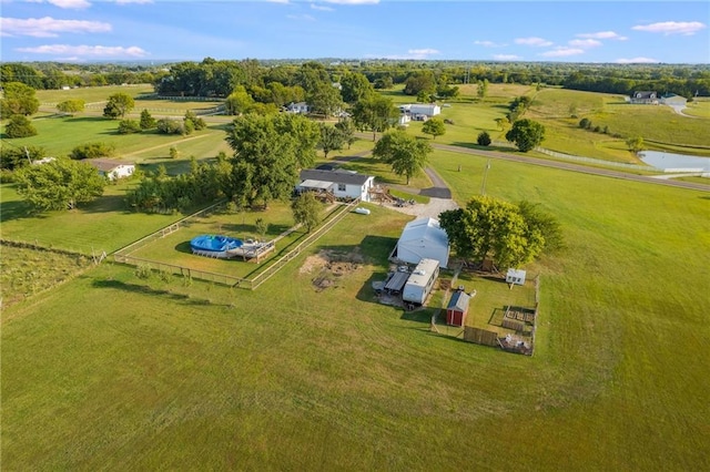 drone / aerial view with a water view and a rural view