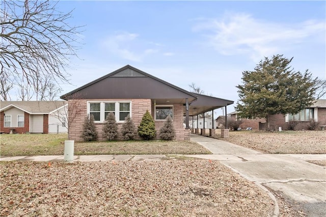 view of front of home featuring a carport