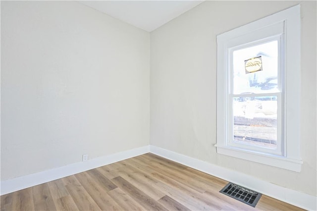 empty room featuring light hardwood / wood-style floors