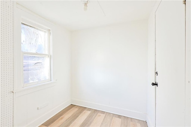 spare room with light wood-type flooring