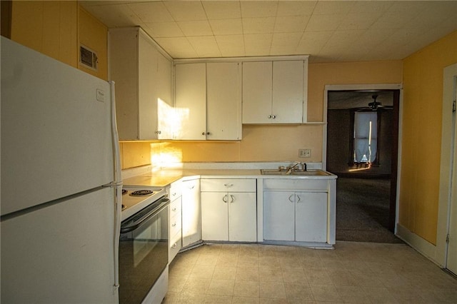 kitchen with ceiling fan, white cabinets, sink, and white appliances