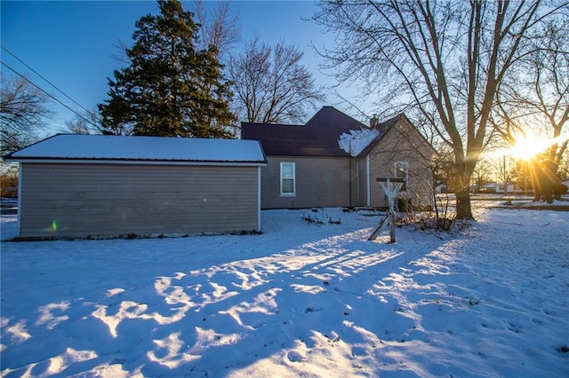 view of snow covered property