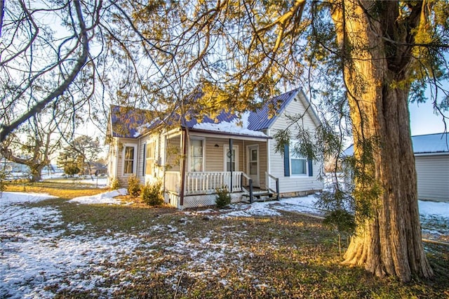 bungalow-style home with covered porch