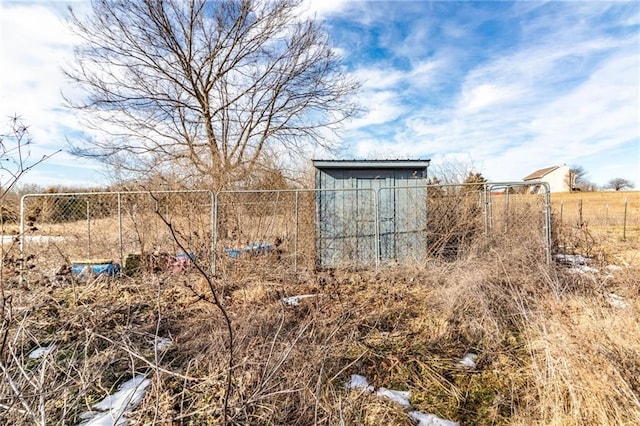 view of outdoor structure with a rural view