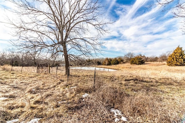 exterior space with a rural view