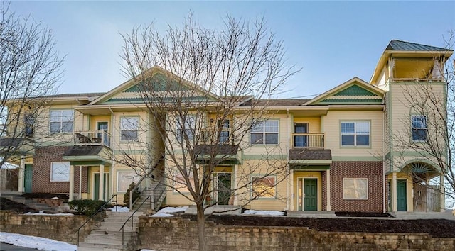 view of front of property featuring brick siding