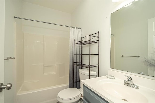 full bathroom featuring toilet, vanity, and shower / bath combo with shower curtain