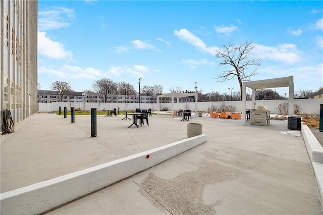 surrounding community featuring a patio area