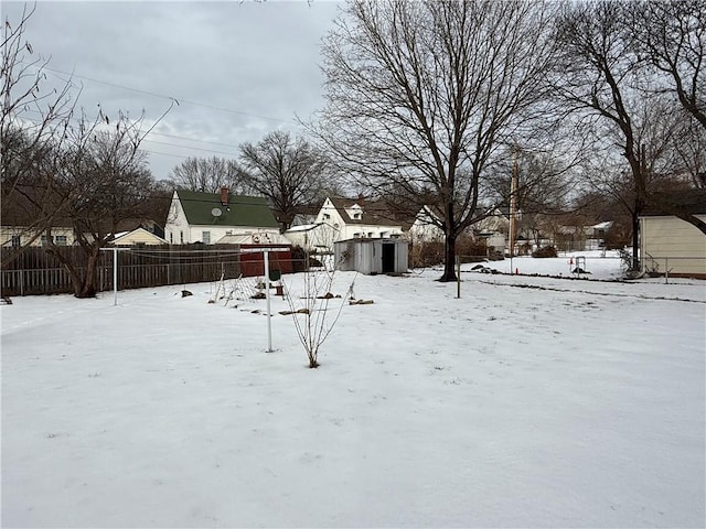 view of yard covered in snow