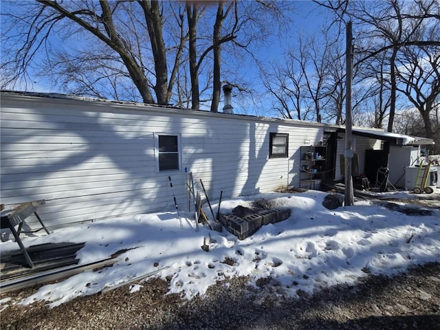 view of snow covered property