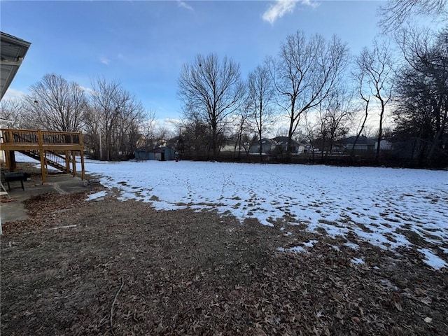 view of yard covered in snow