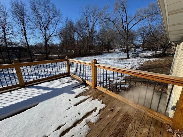 view of snow covered deck