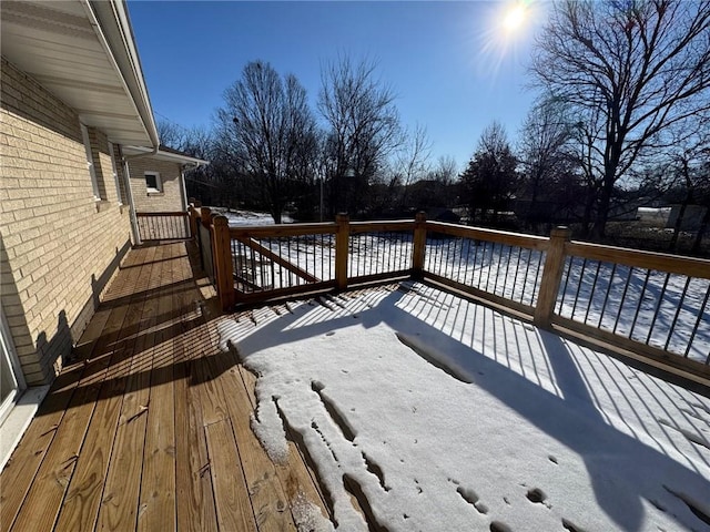 view of snow covered deck