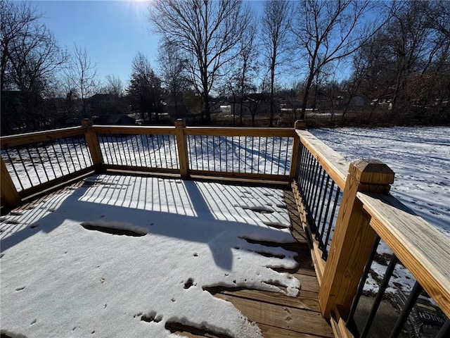 view of snow covered deck