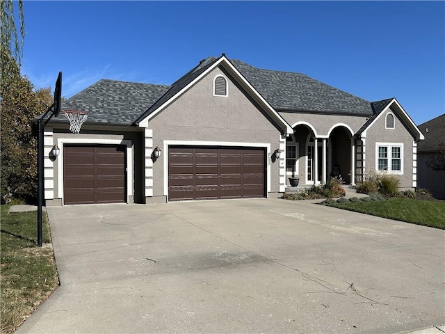 view of front of home with a garage